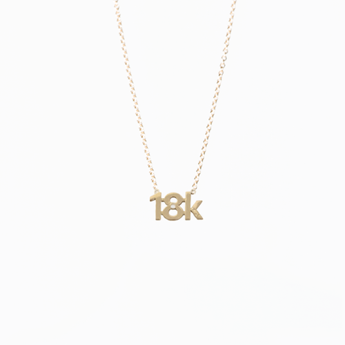 CA "18K" logo 18 Karat Yellow Gold and Diamond Pendant