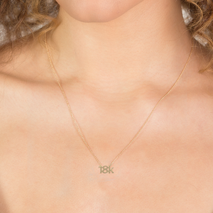 CA "18K" logo 18 Karat Yellow Gold and Diamond Pendant